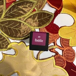 Color Street Baddie Lipstick - Berry-plum satin finish.